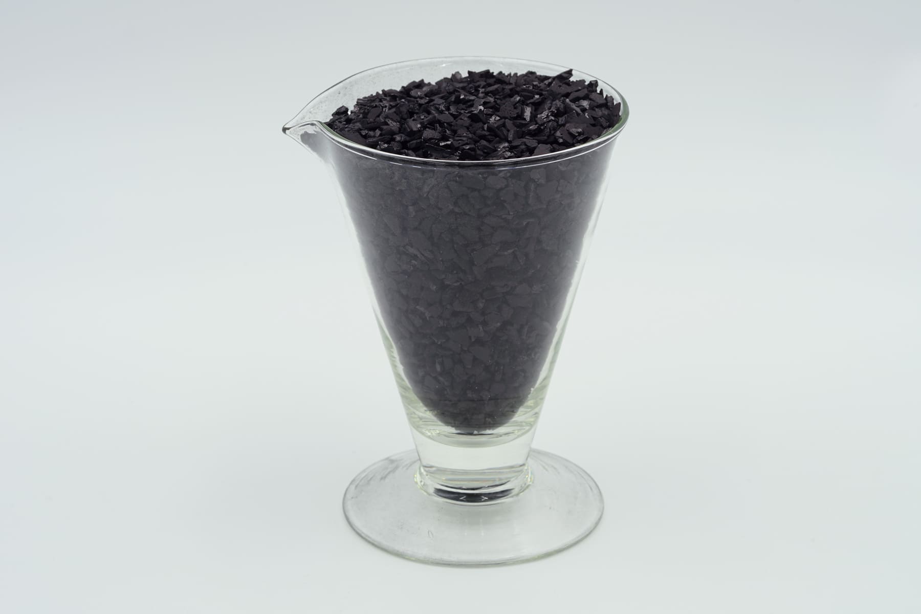 Loads for activated carbon traps