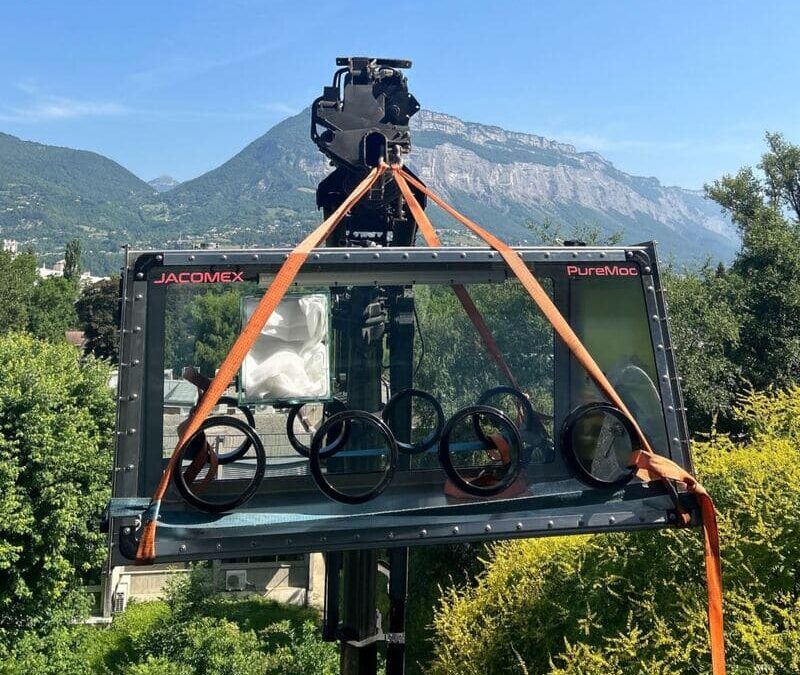 A glove box between sky and mountains